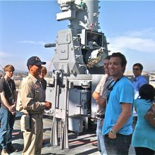 A group of students touring a Naval Ship